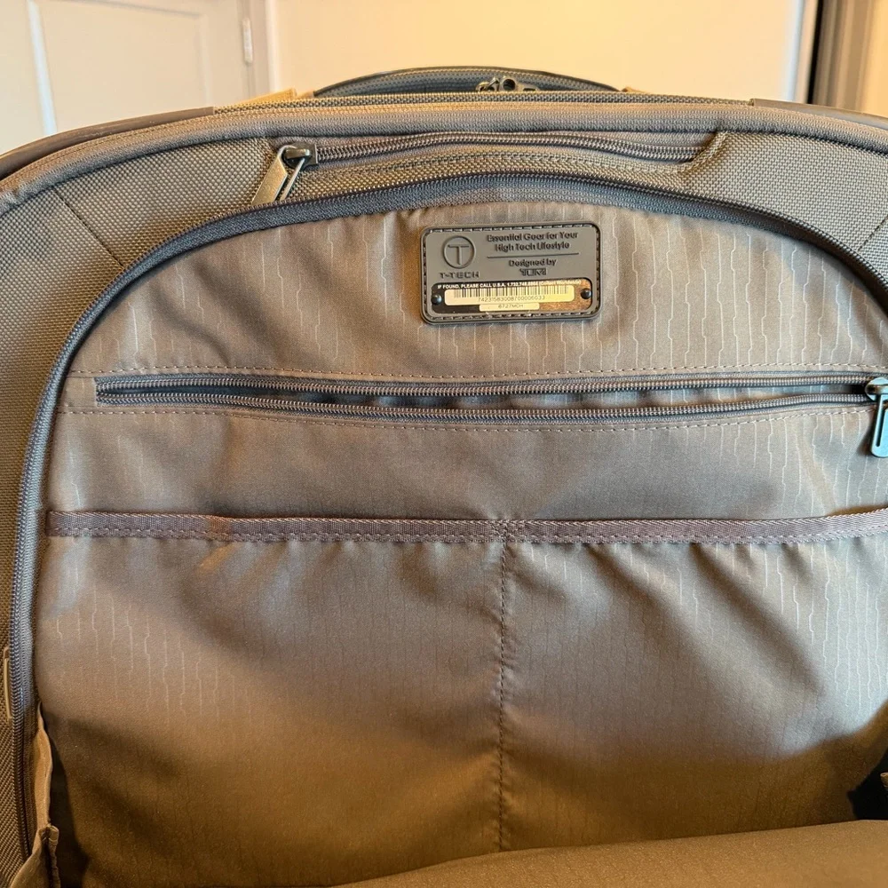 Tumi Brown Backpack with Multiple Compartments